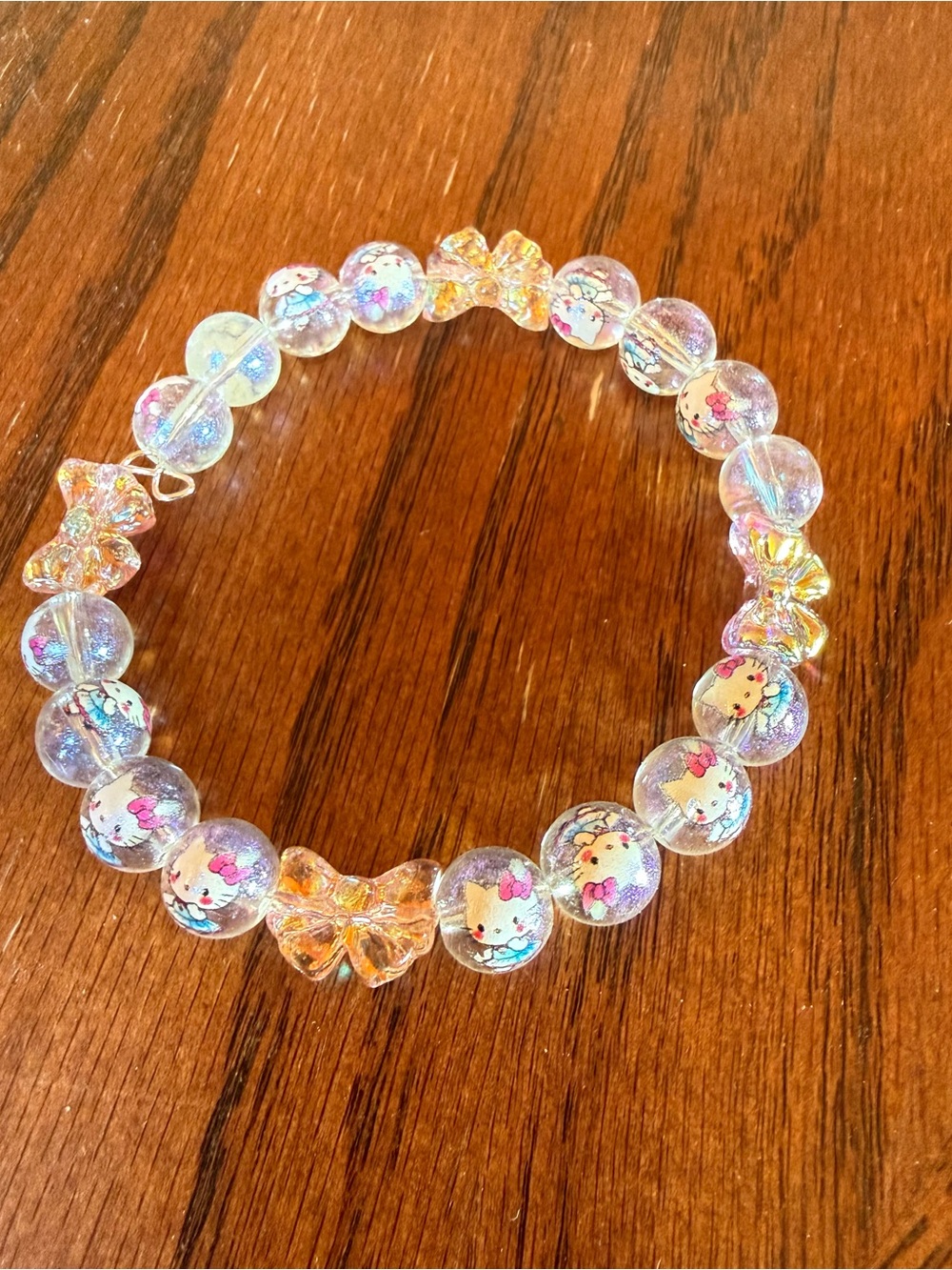 Kids Clear Iridescent Hello Kitty Beaded Bracelet with Pink Bow Accents